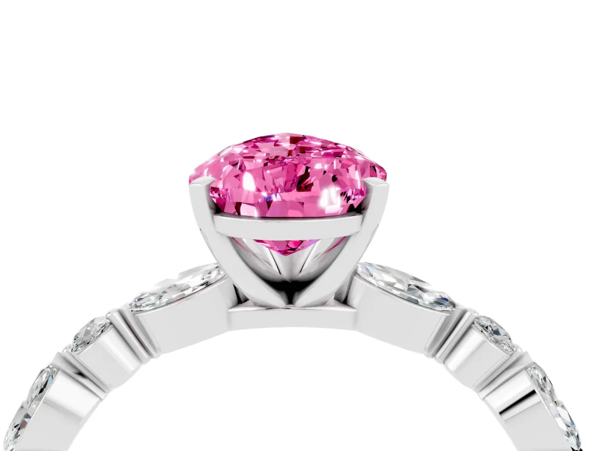 Pear Cut Pink Sapphire Ring with Marquise and Round Side Stones and Four-Prong Setting Silver