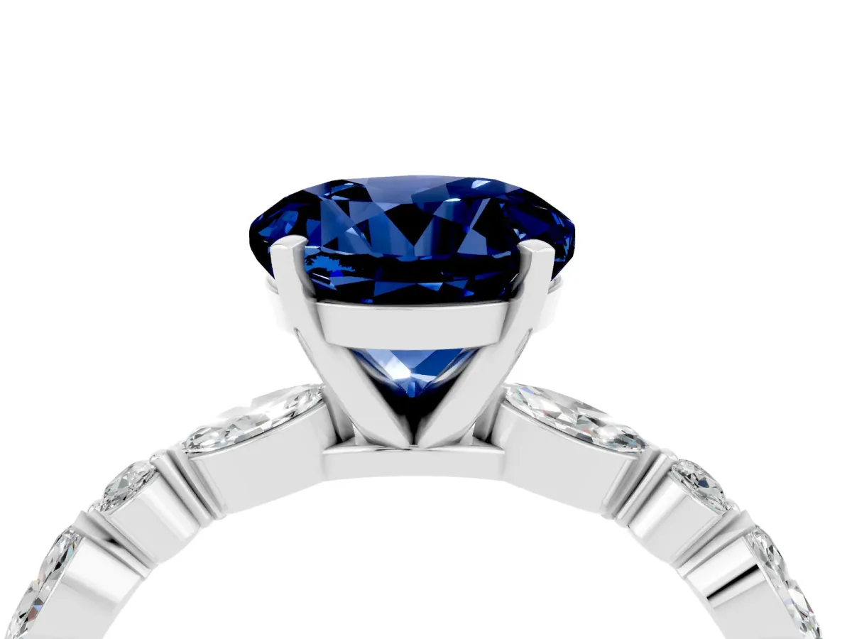 Round Cut Blue Sapphire Ring with Marquise and Round Side Stones and Four-Prong Setting Silver