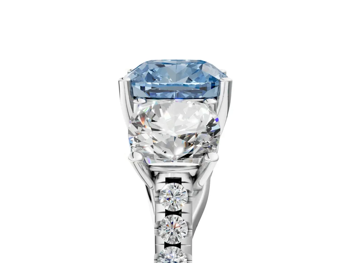 Fancy Blue Three-Stone Cushion Cut Diamond Ring with Round Pavé Band and Prong Setting White gold