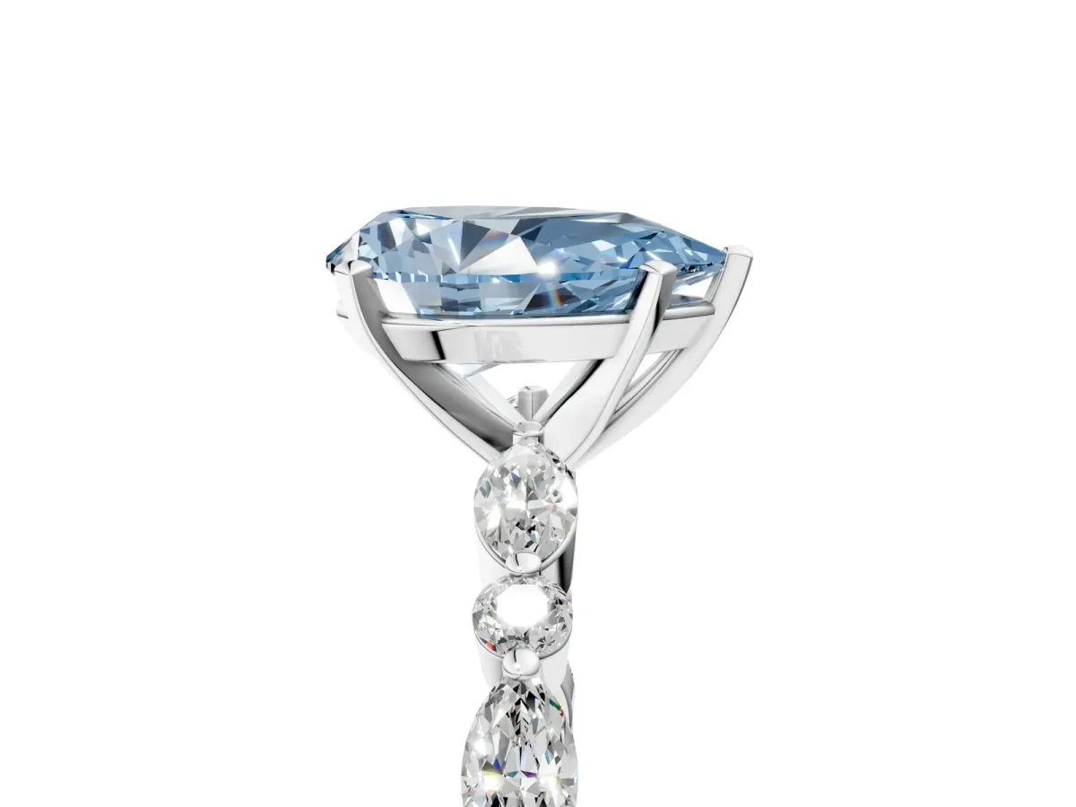 Fancy Blue Pear Cut Diamond Ring with Marquise and Round Side Stones and Four-Prong Setting Platinum