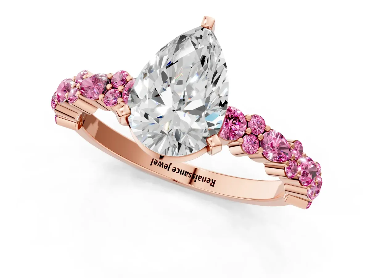 Pear Cut Diamond Side Stone Solitaire Ring with Round Pink Sapphire and Four-Prong Setting Rose gold