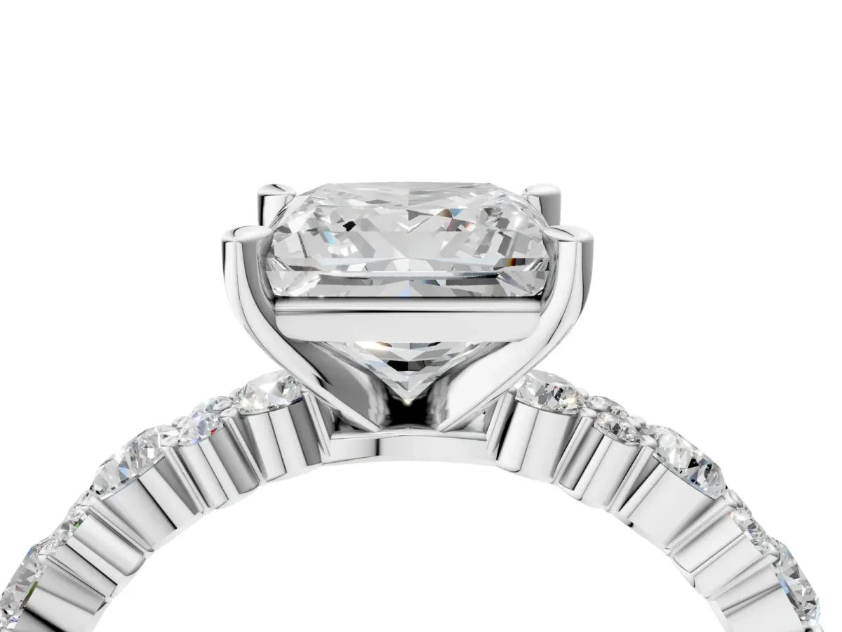 Princess Cut Diamond Side Stone Solitaire Ring with Round and Four-Prong Setting Platinum