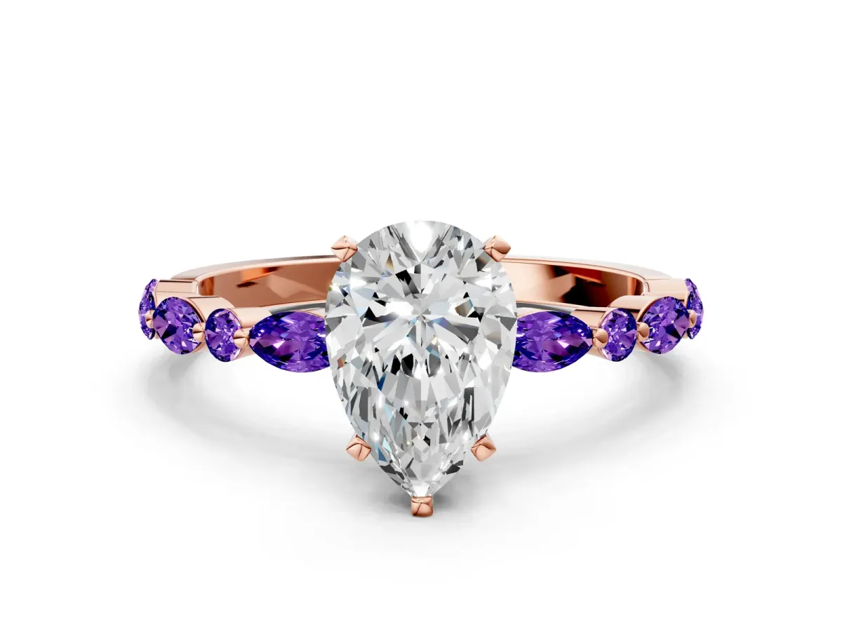 Pear Cut Diamond Ring with Marquise and Round Tanzanite Side Stones and Four-Prong Setting Rose gold