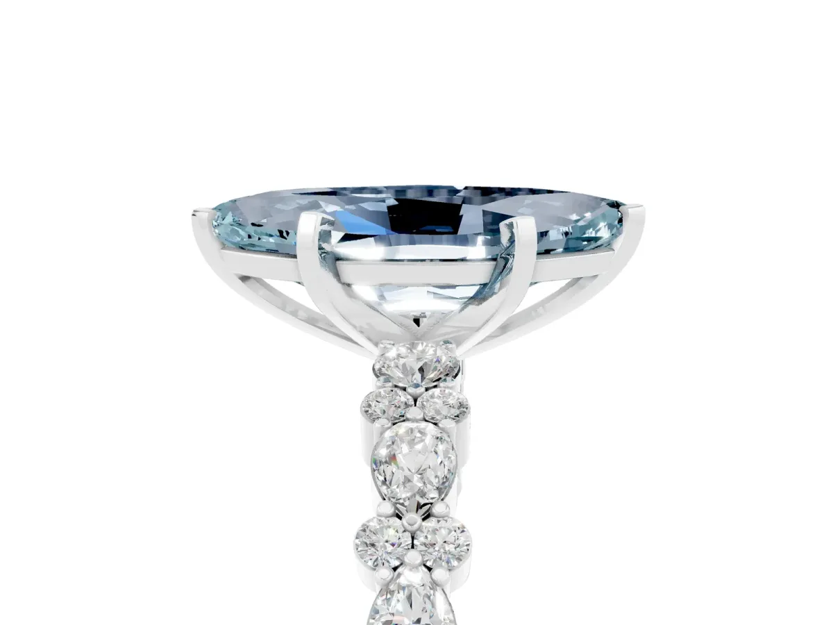 Marquise Cut Aquamarine Side Stone Solitaire Ring with Round and Four-Prong Setting Silver
