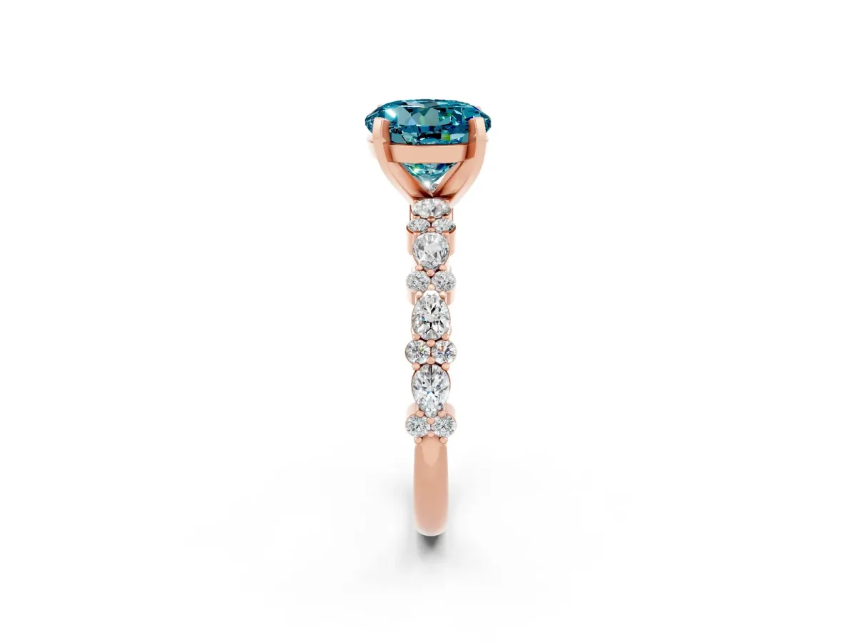 Round Cut Blue Topaz Side Stone Solitaire Ring with Round and Four-Prong Setting Rose gold