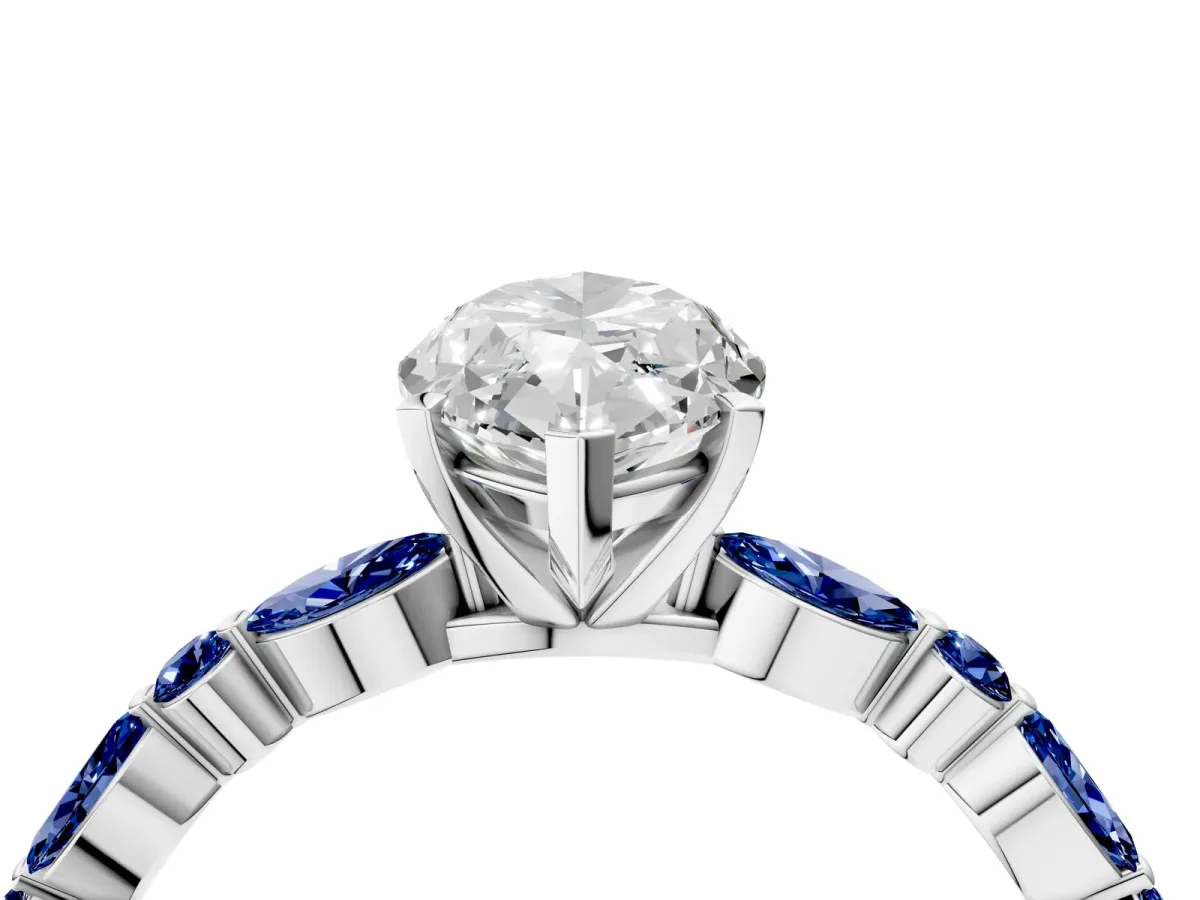 Marquise Cut Diamond Ring with Marquise and Round Blue Sapphire Side Stones and Four-Prong Setting Silver
