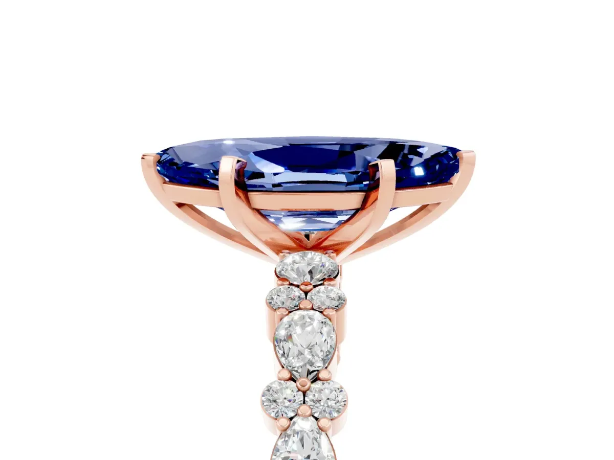 Marquise Cut Blue Sapphire Side Stone Solitaire Ring with Round and Four-Prong Setting Rose gold