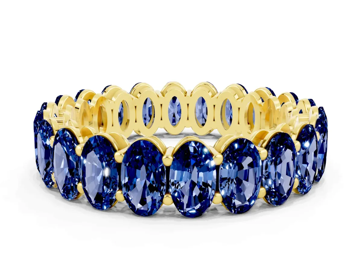 Oval Cut Blue Sapphire Eternity Band with Shared Prong Setting Yellow gold