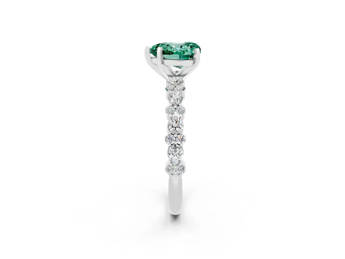 Heart Cut Green Sapphire Side Stone Solitaire Ring with Round and Four-Prong Setting Silver