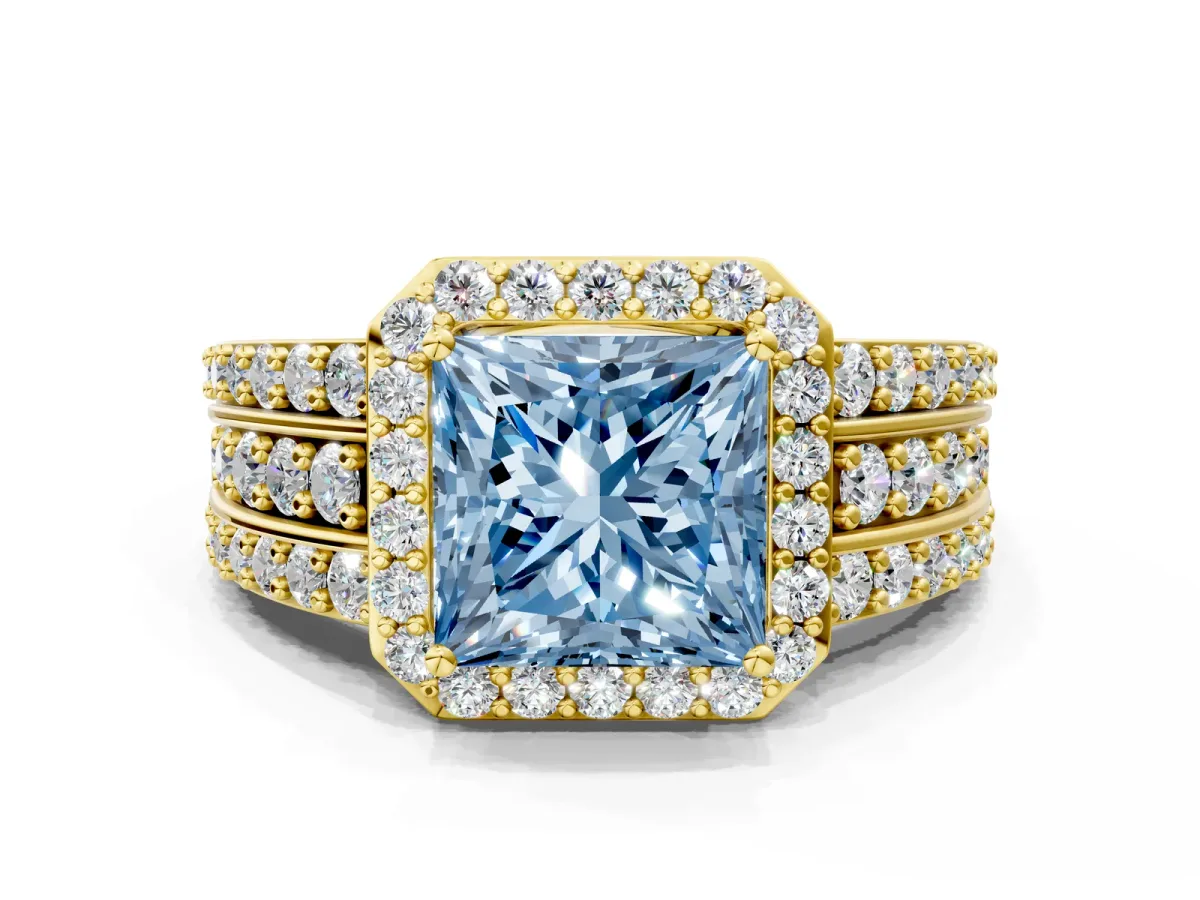 Fancy Blue Princess Cut Halo Diamond Ring with Round Split Shank and Prong Setting Yellow gold