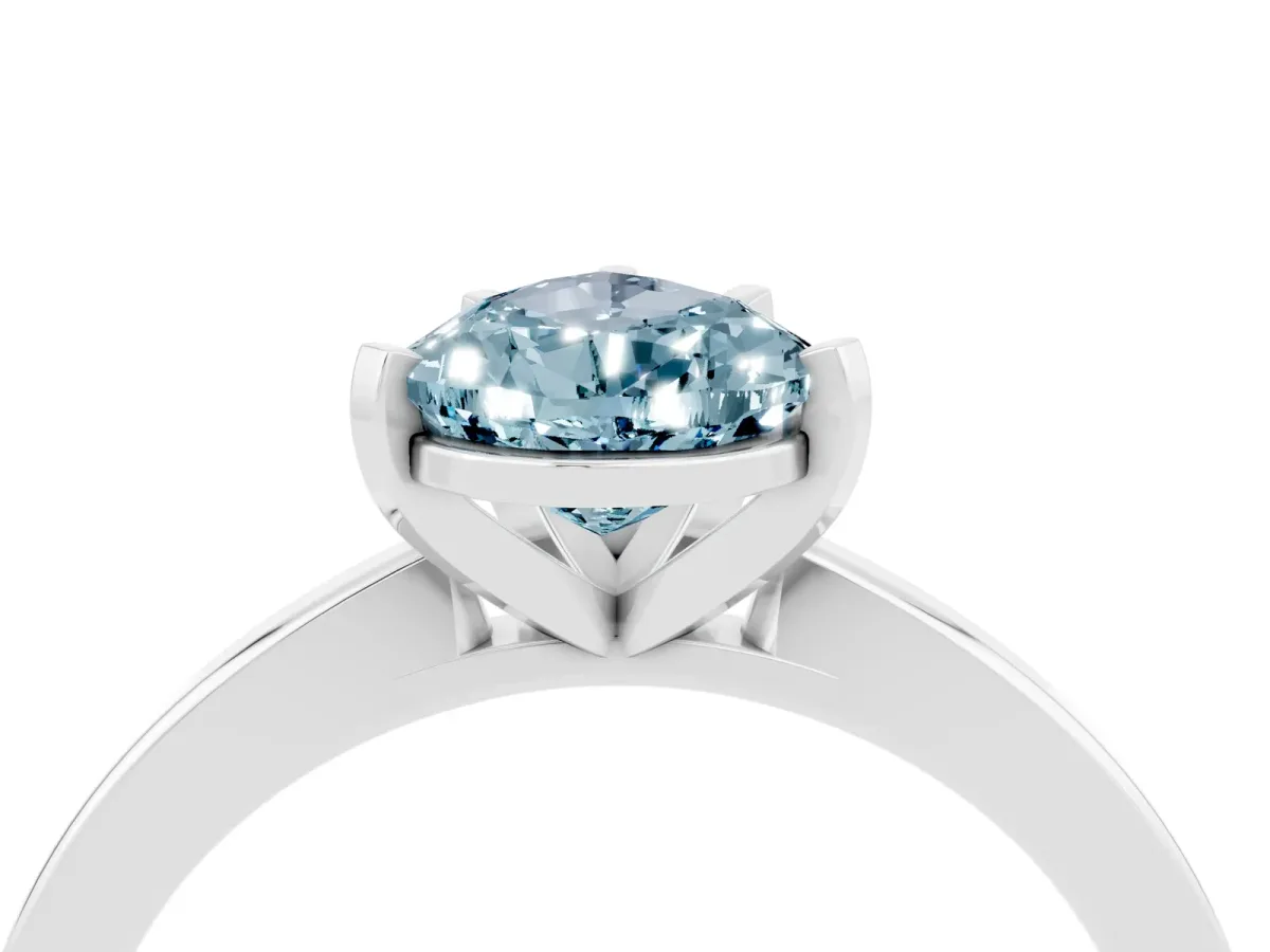 Pear Cut Aquamarine Solitaire Engagement Ring with Classic Band and Four-Prong Setting Silver