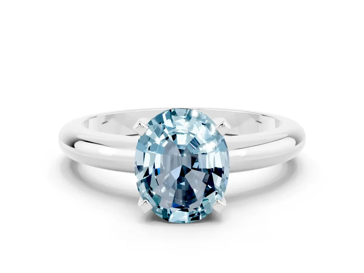 Oval Cut Aquamarine Solitaire Engagement Ring with Round Band and Four-Prong Setting Platinum