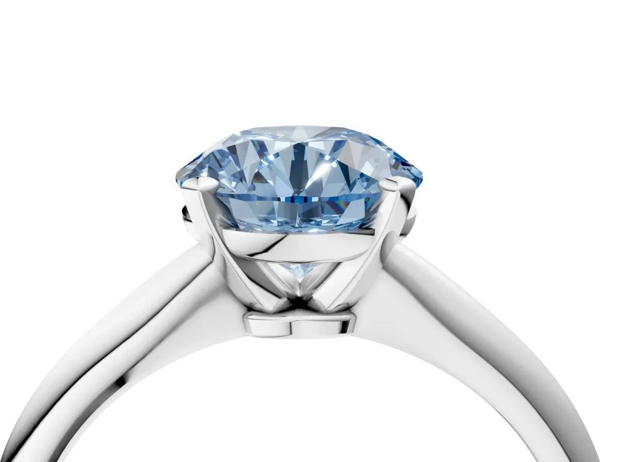 Fancy Blue Round Cut Diamond Solitaire Engagement Ring with Classic Band and Four-Prong Setting White gold