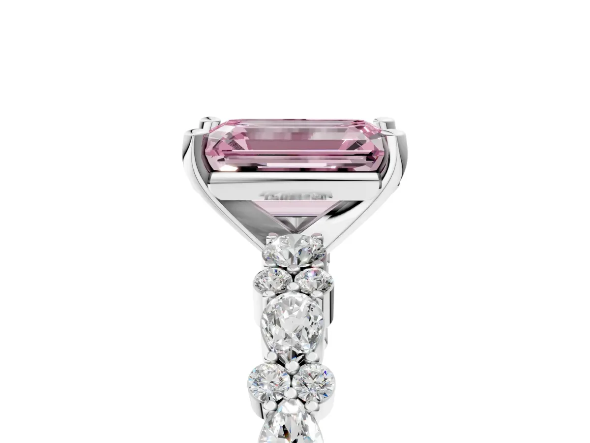 Fancy Pink Emerald Cut Diamond Side Stone Solitaire Ring with Round and Four-Prong Setting White gold