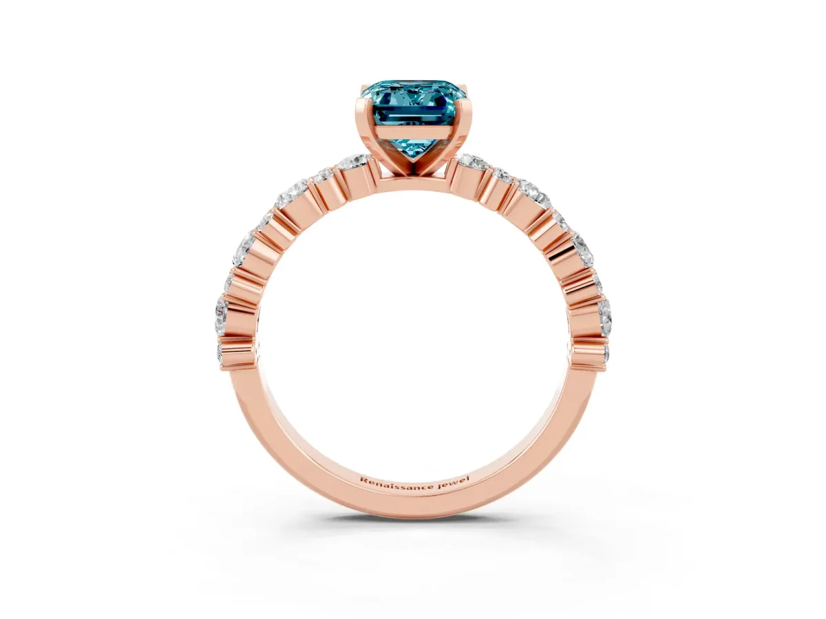 Emerald Cut Blue Topaz Side Stone Solitaire Ring with Round and Four-Prong Setting Rose gold