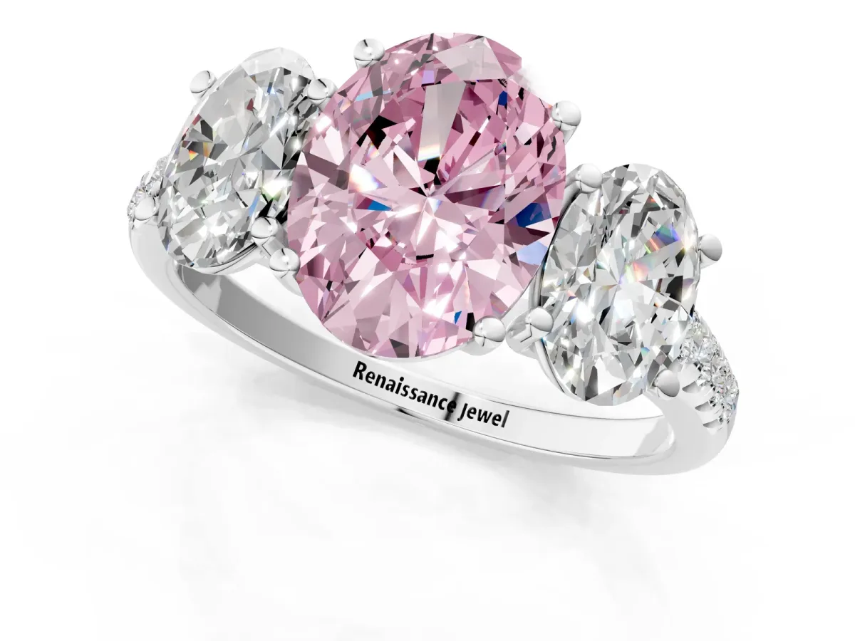 Fancy Pink Three-Stone Oval Cut Diamond Ring with Round Pavé Band and Prong Setting White gold