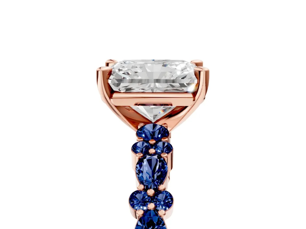 Radiant Cut Diamond Side Stone Solitaire Ring with Round Blue Sapphire and Four-Prong Setting Rose gold