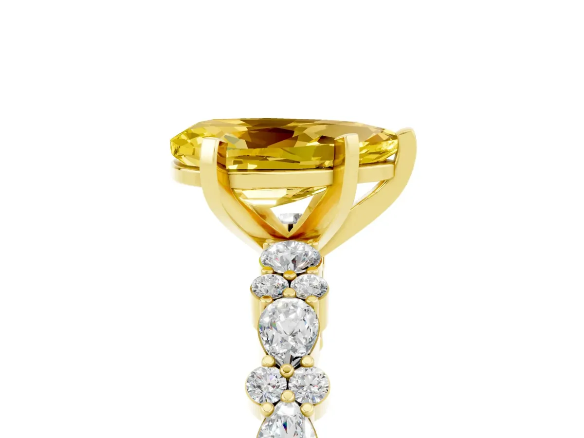 Pear Cut Yellow Sapphire Side Stone Solitaire Ring with Round and Four-Prong Setting Yellow gold