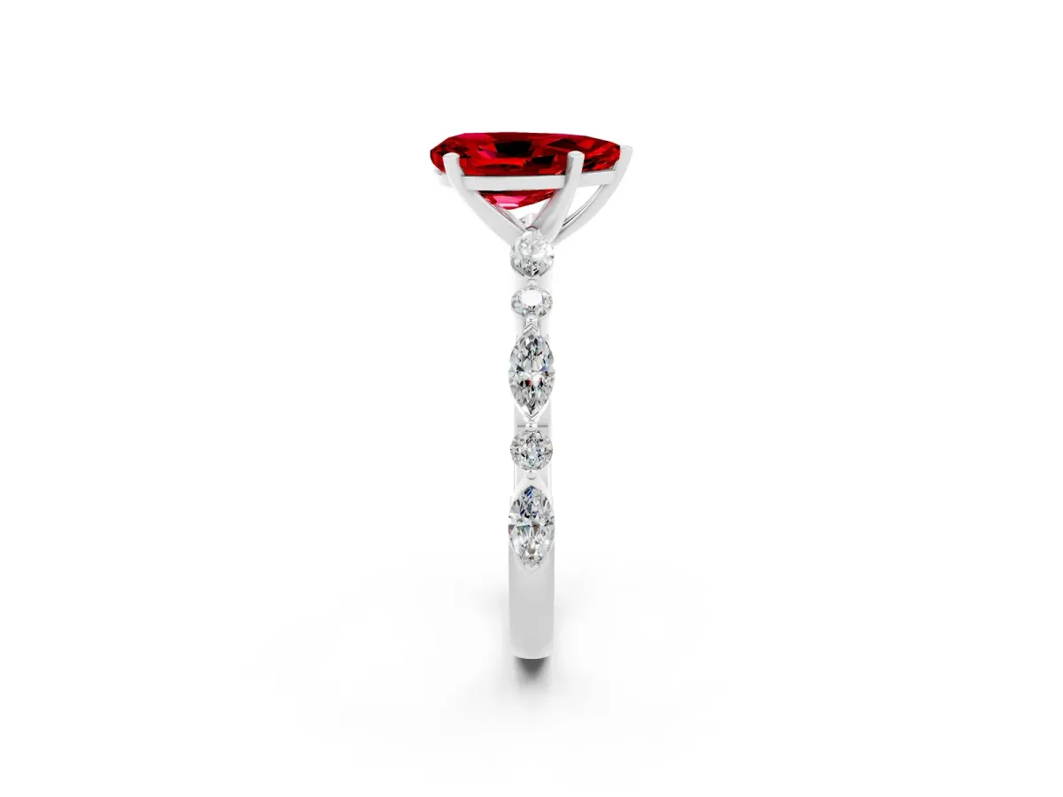 Pear Cut Ruby Ring with Marquise and Round Side Stones and Four-Prong Setting Platinum