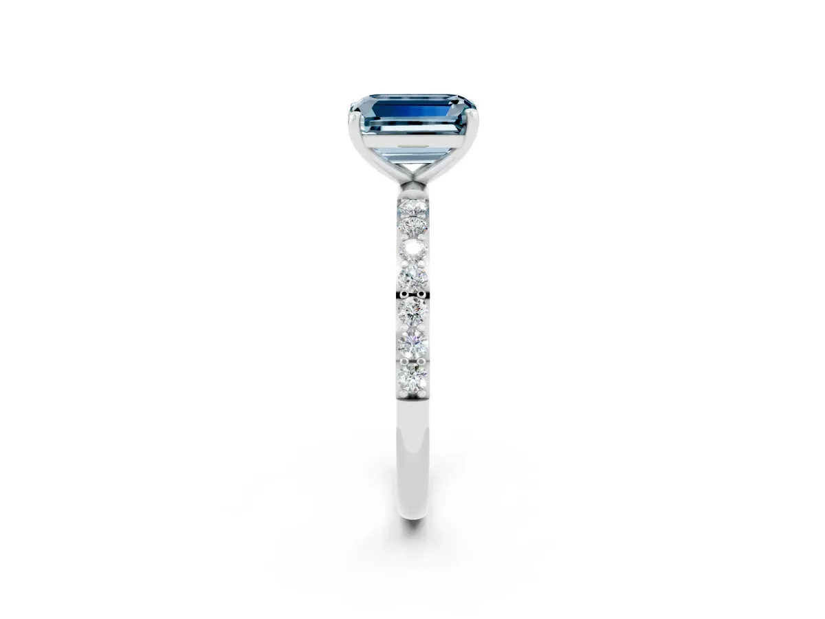 Emerald Cut Aquamarine Solitaire Ring with Round Pavé Band and Prong Setting Platinum