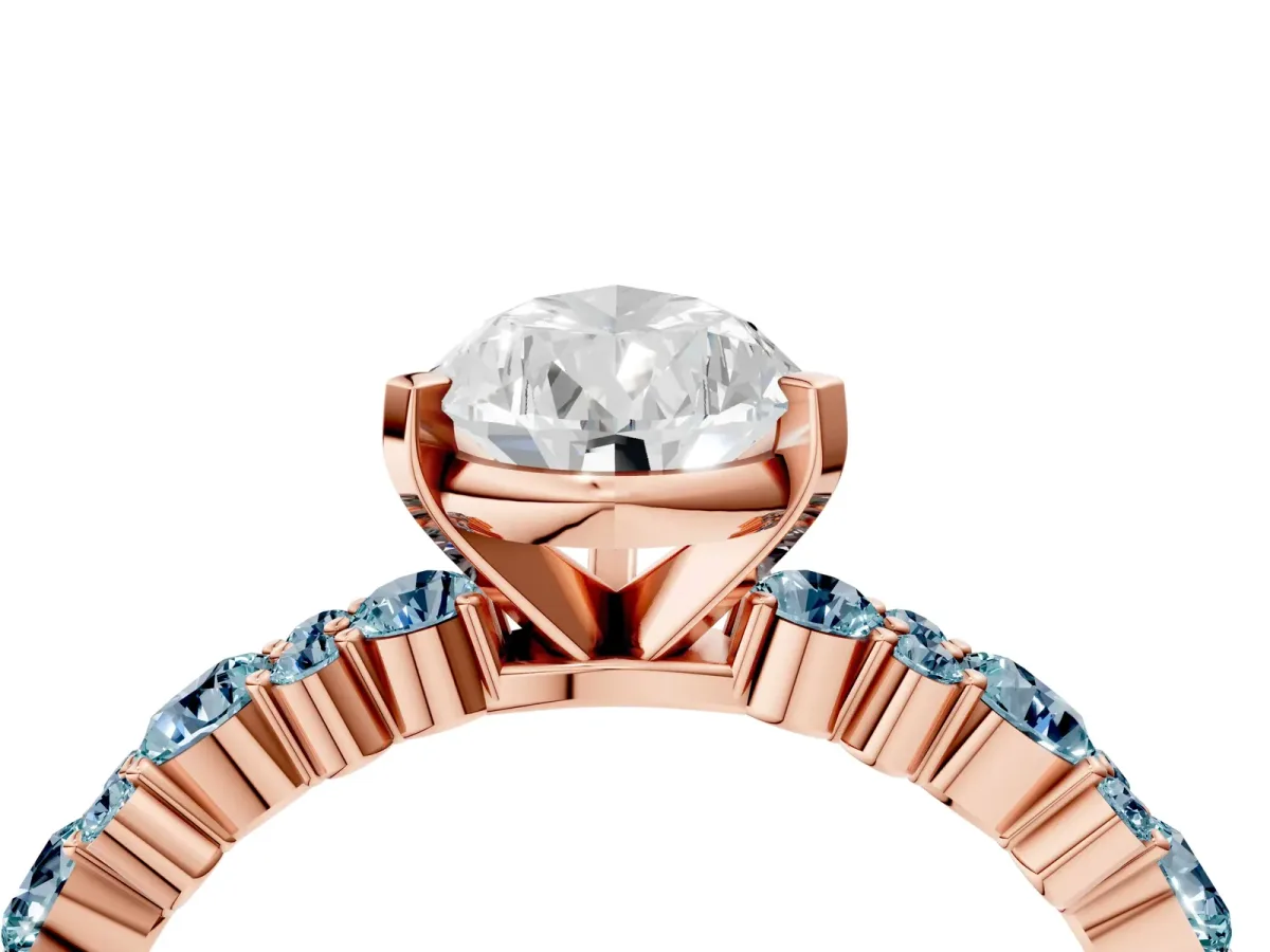 Pear Cut Diamond Side Stone Solitaire Ring with Round Aquamarine and Four-Prong Setting Rose gold