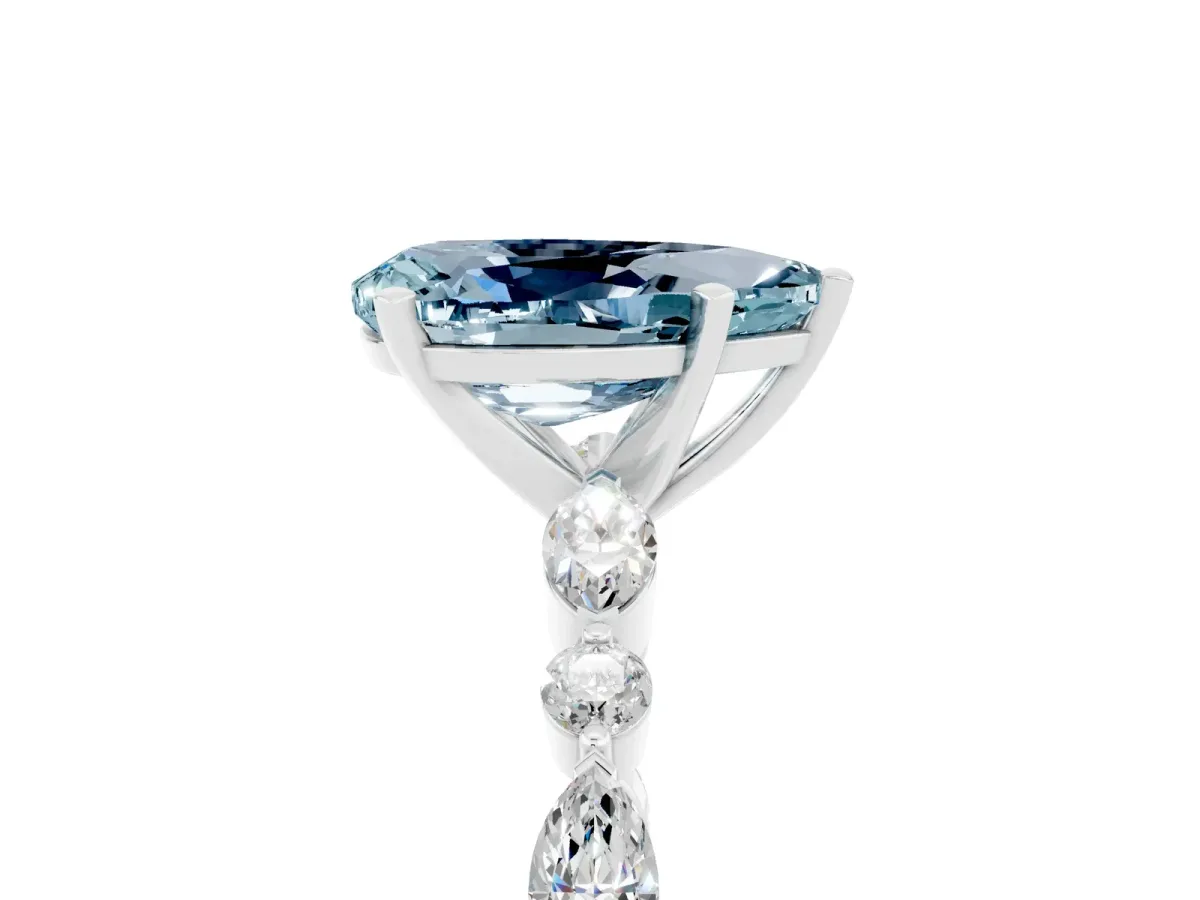 Pear Cut Aquamarine Ring with Marquise and Round Side Stones and Four-Prong Setting Silver
