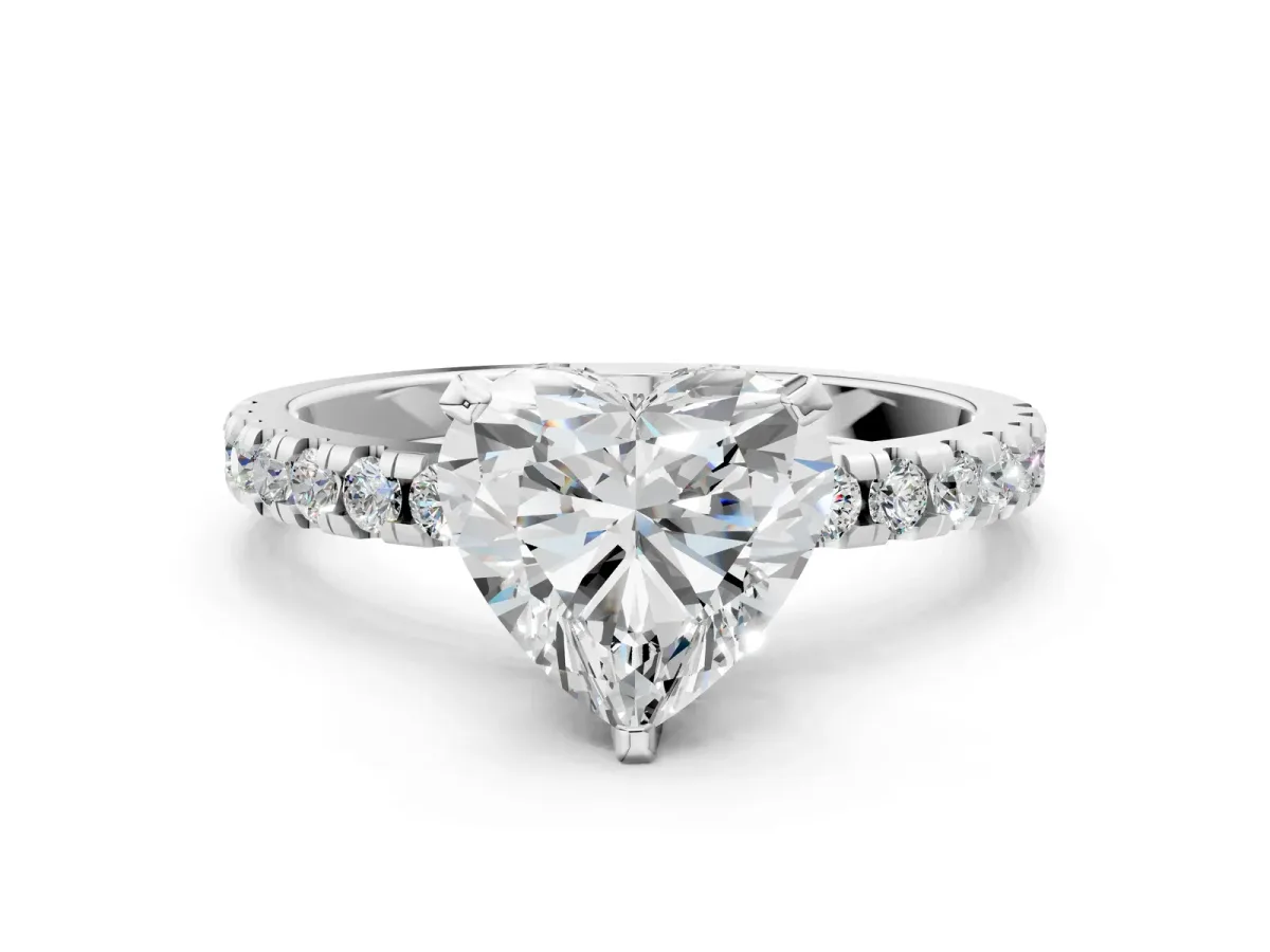 Heart Cut Diamond Solitaire Ring with Round Pavé Band and Four-Prong Setting Platinum