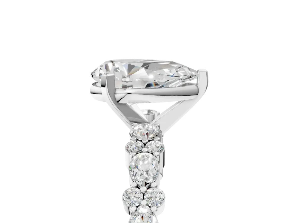 Pear Cut Diamond Side Stone Solitaire Ring with Round Moissanite and Four-Prong Setting White gold