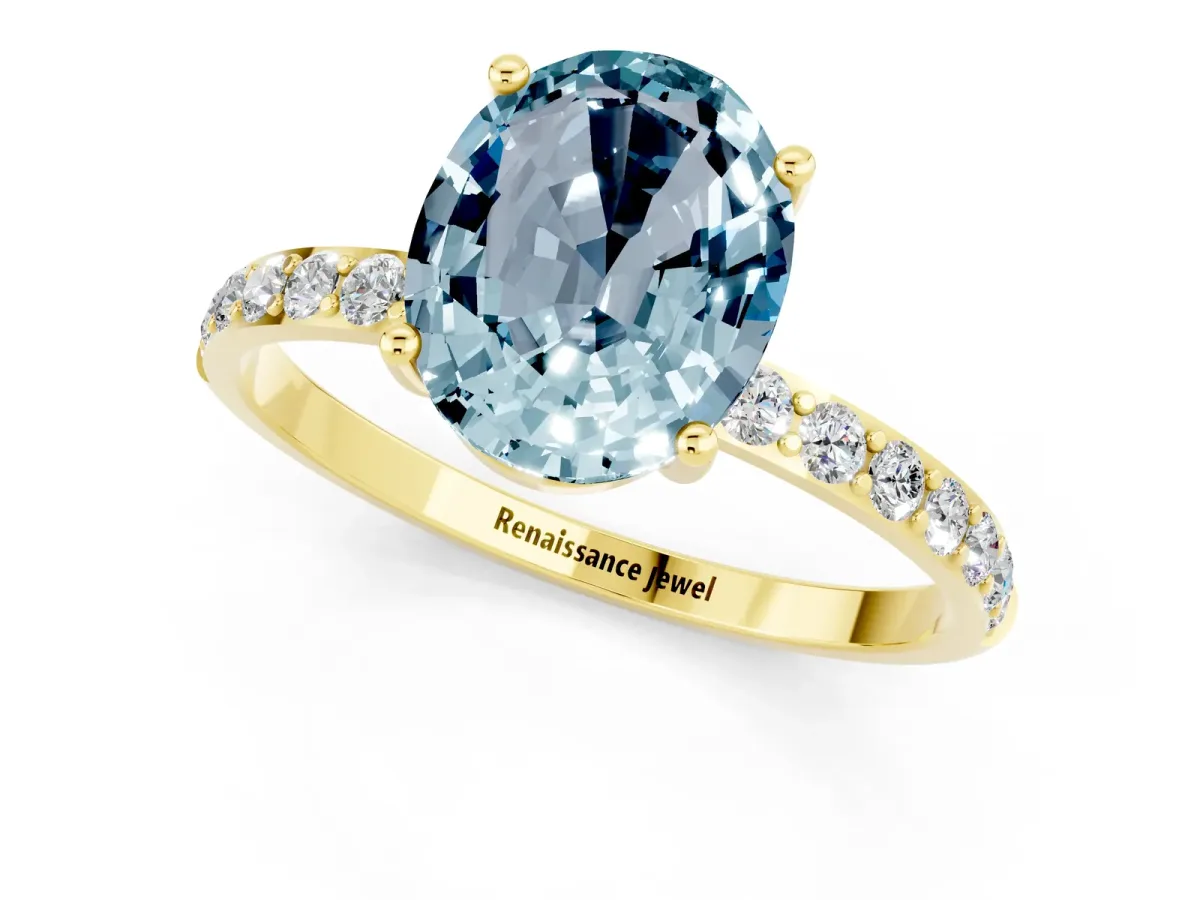 Oval Cut Aquamarine Solitaire Ring with Round Pavé Band and Prong Setting Yellow gold