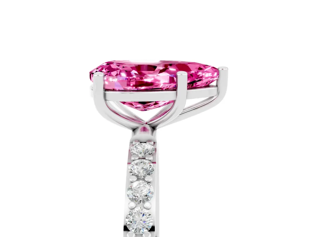 Pear Cut Pink Sapphire Solitaire Ring with Round Pavé Band and Prong Setting Silver