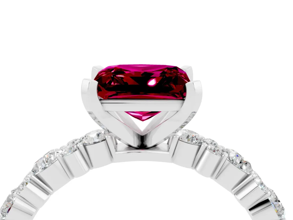 Princess Cut Garnet Side Stone Solitaire Ring with Round and Four-Prong Setting Platinum