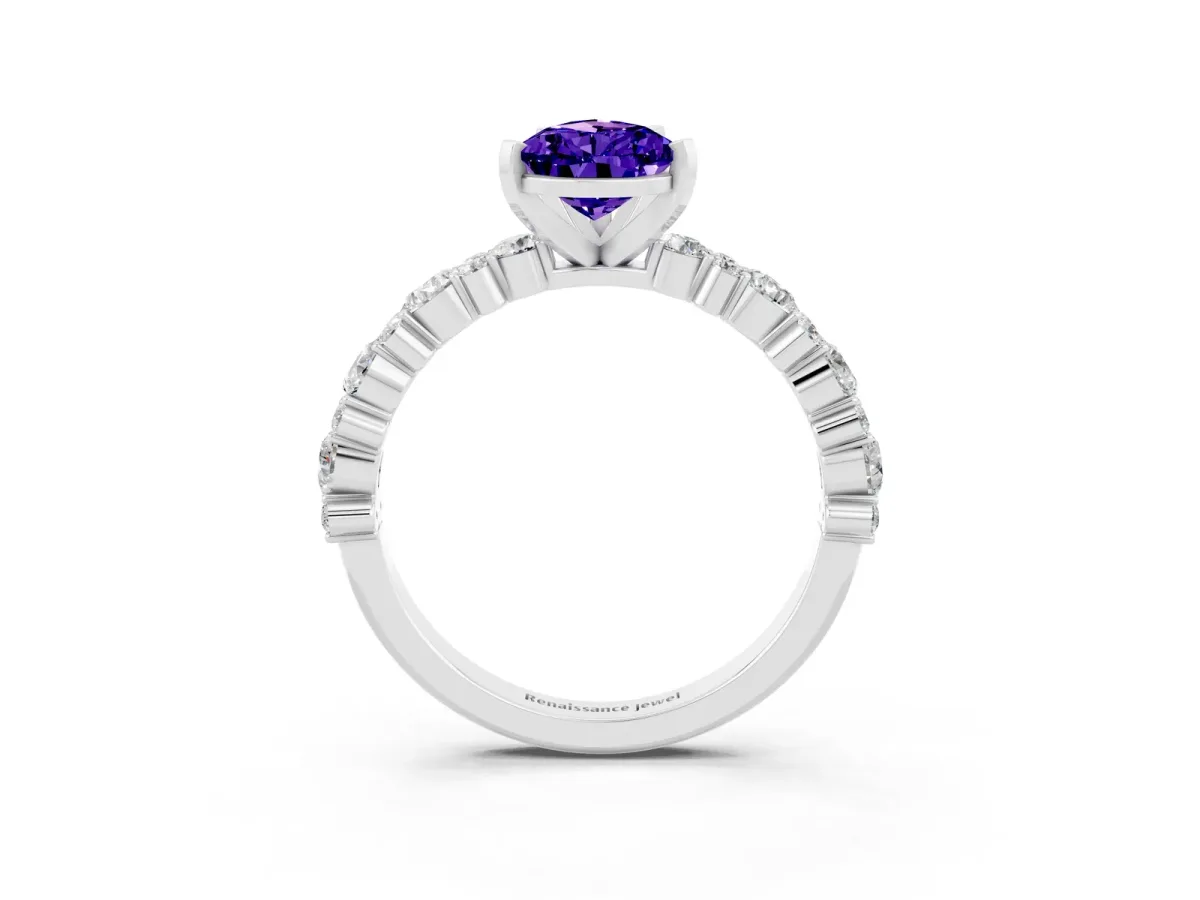 Pear Cut Tanzanite Side Stone Solitaire Ring with Round and Four-Prong Setting Silver