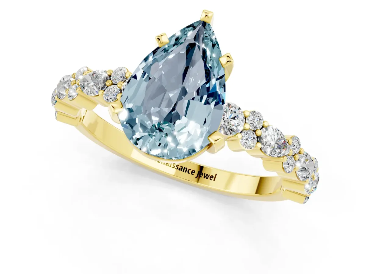 Pear Cut Aquamarine Side Stone Solitaire Ring with Round and Four-Prong Setting Yellow gold