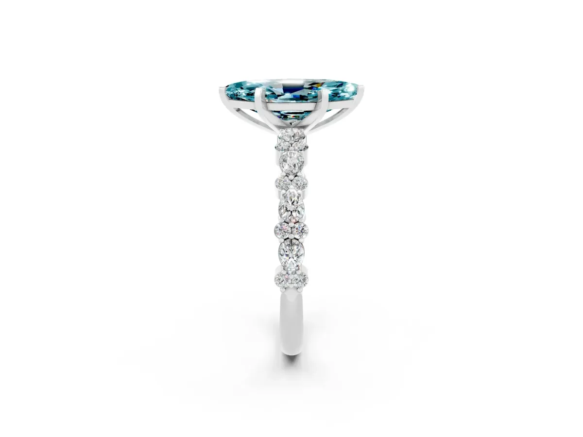 Marquise Cut Blue Topaz Side Stone Solitaire Ring with Round and Four-Prong Setting White gold