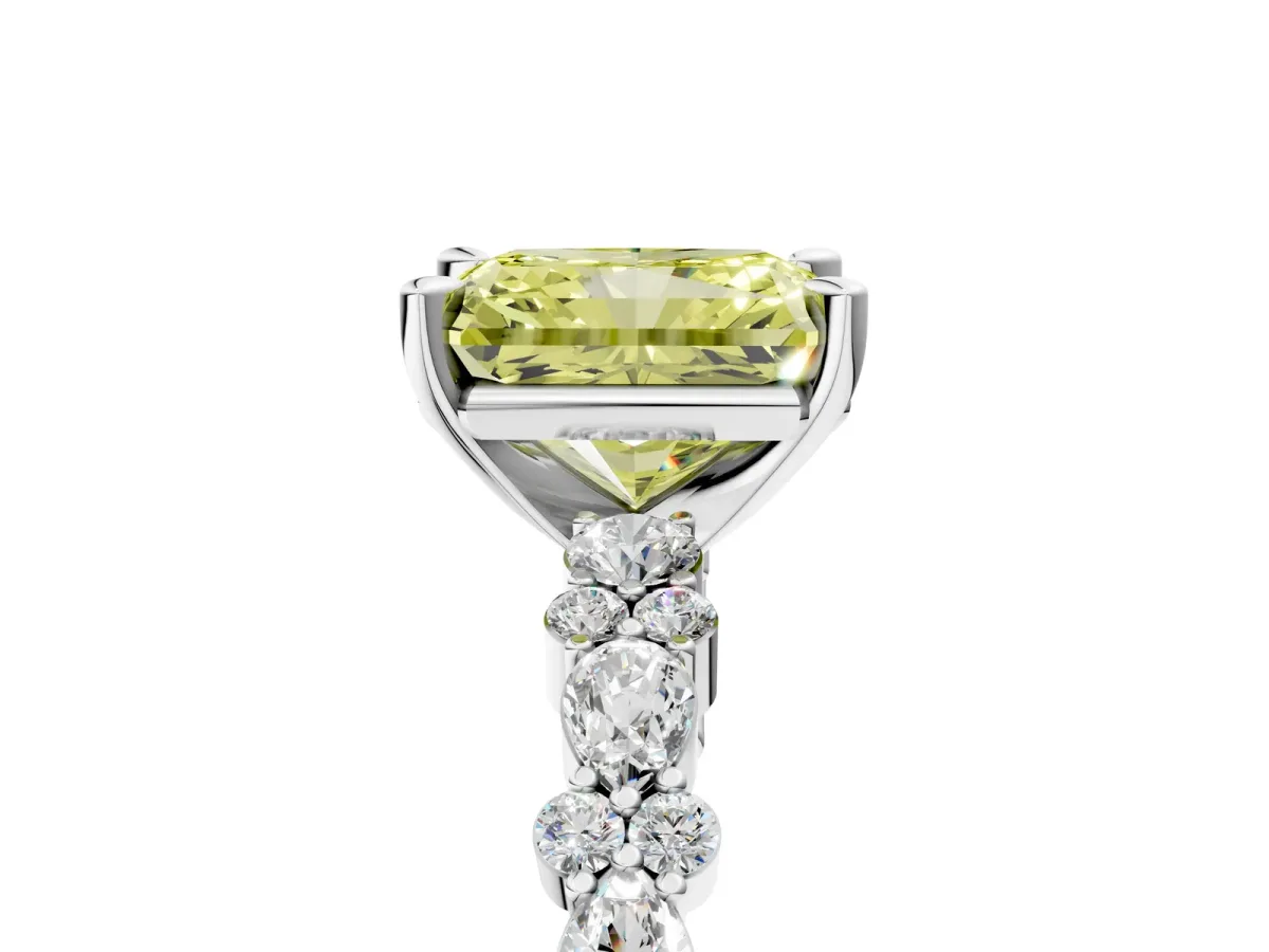 Fancy Yellow Radiant Cut Diamond Side Stone Solitaire Ring with Round and Four-Prong Setting Platinum