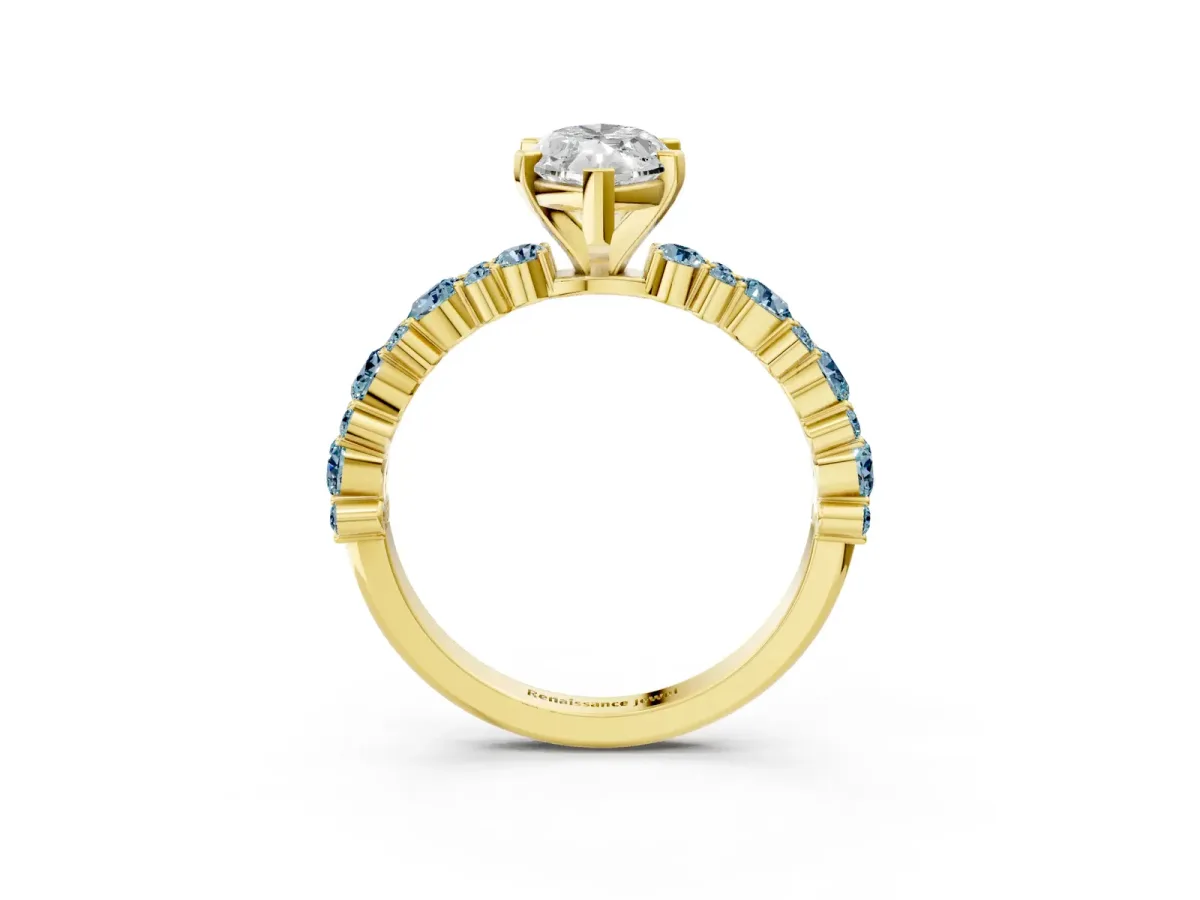 Marquise Cut Diamond Side Stone Solitaire Ring with Round Aquamarine and Four-Prong Setting Yellow gold