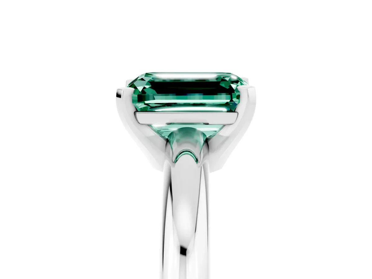 Emerald Cut Green Sapphire Solitaire Engagement Ring with Round Band and Four-Prong Setting Platinum