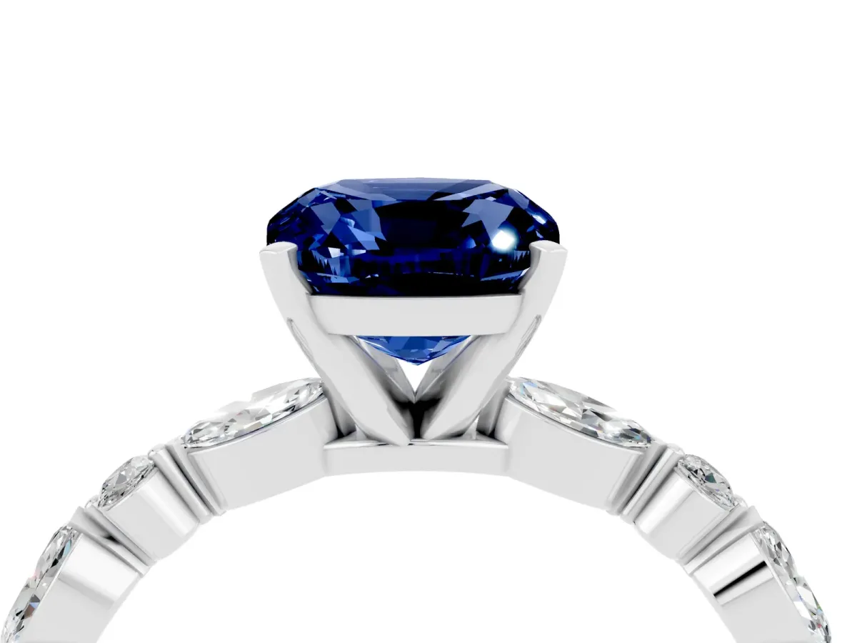 Cushion Cut Blue Sapphire Ring with Marquise and Round Side Stones and Four-Prong Setting Silver