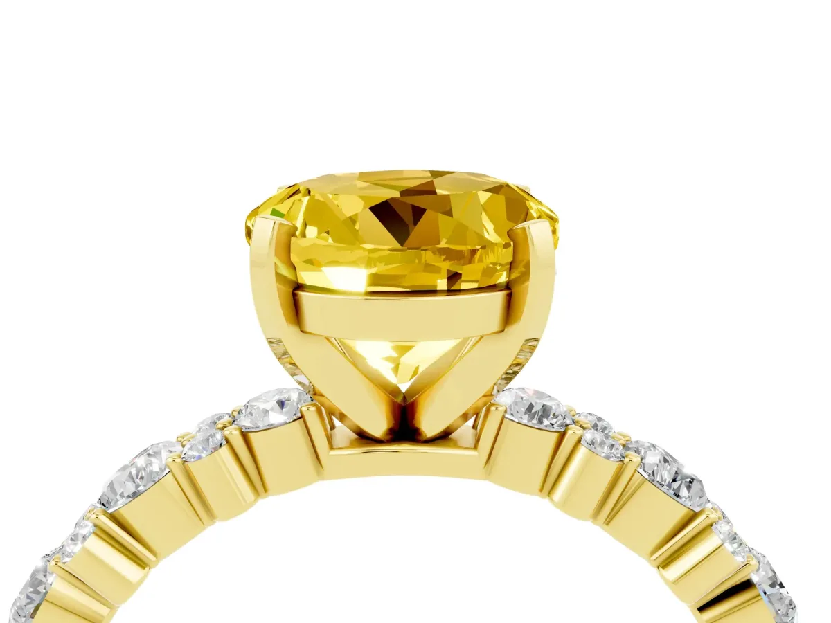 Round Cut Yellow Sapphire Side Stone Solitaire Ring with Round and Four-Prong Setting Yellow gold