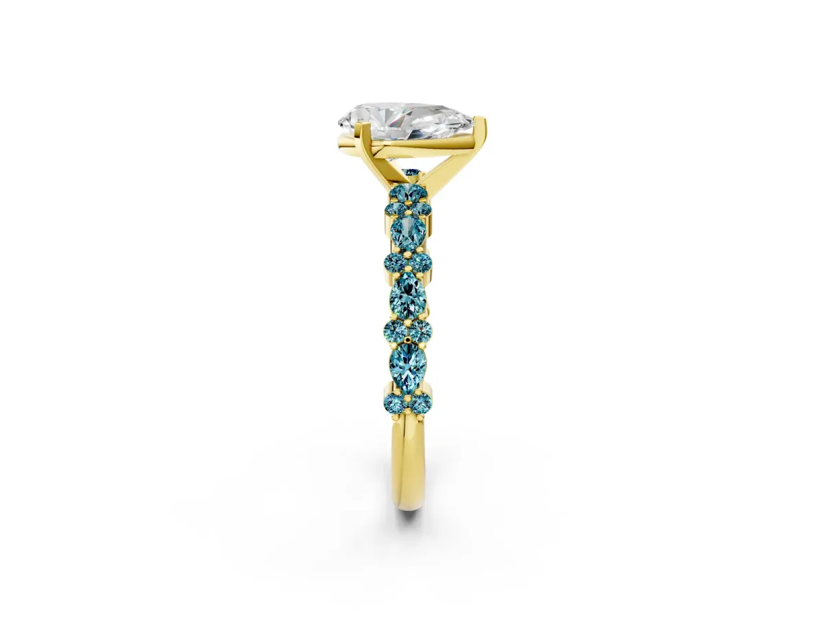 Pear Cut Diamond Side Stone Solitaire Ring with Round Blue Topaz and Four-Prong Setting Yellow gold
