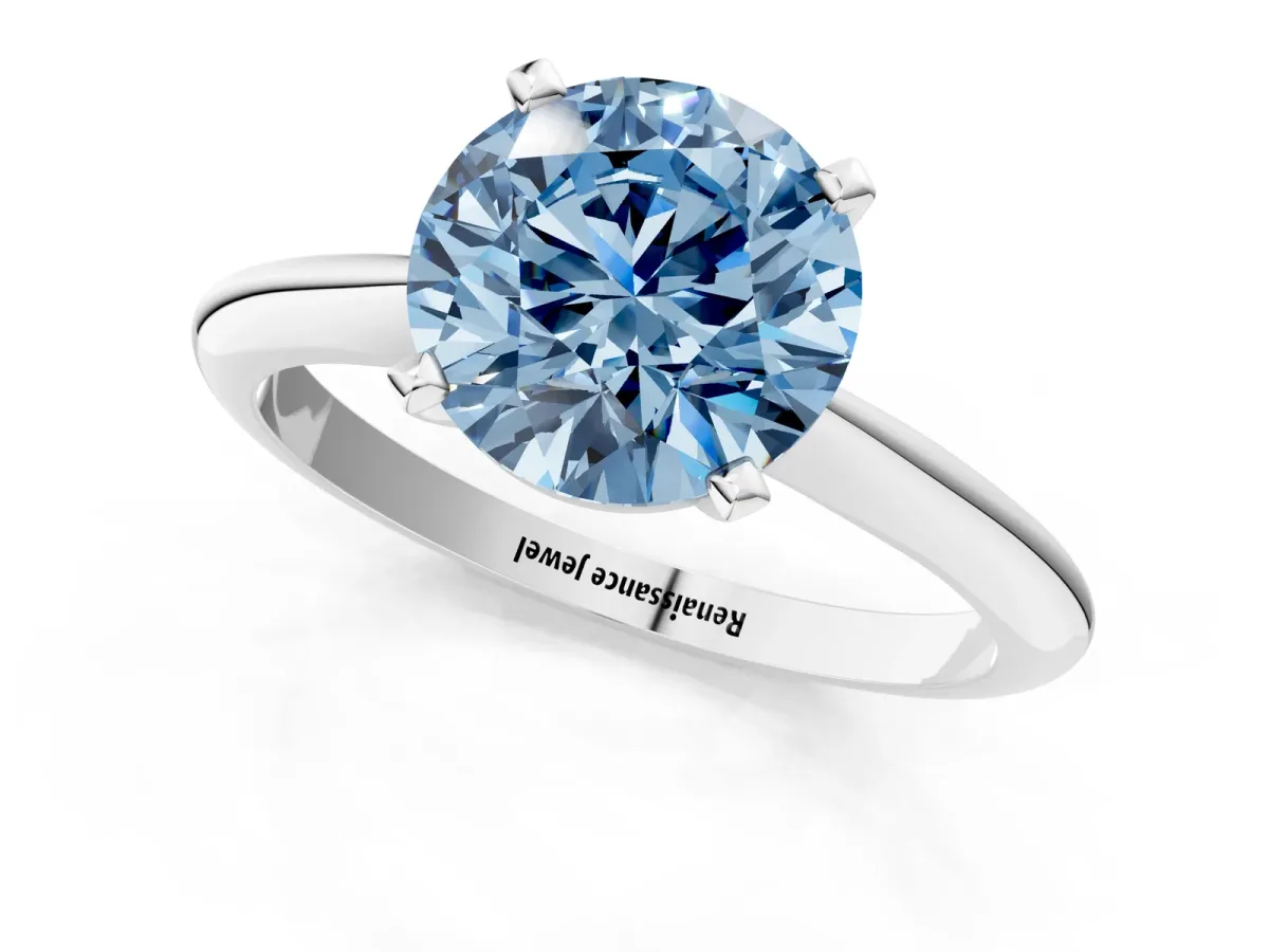 Fancy Blue Round Cut Diamond Solitaire Engagement Ring with Classic Band and Four-Prong Setting White gold