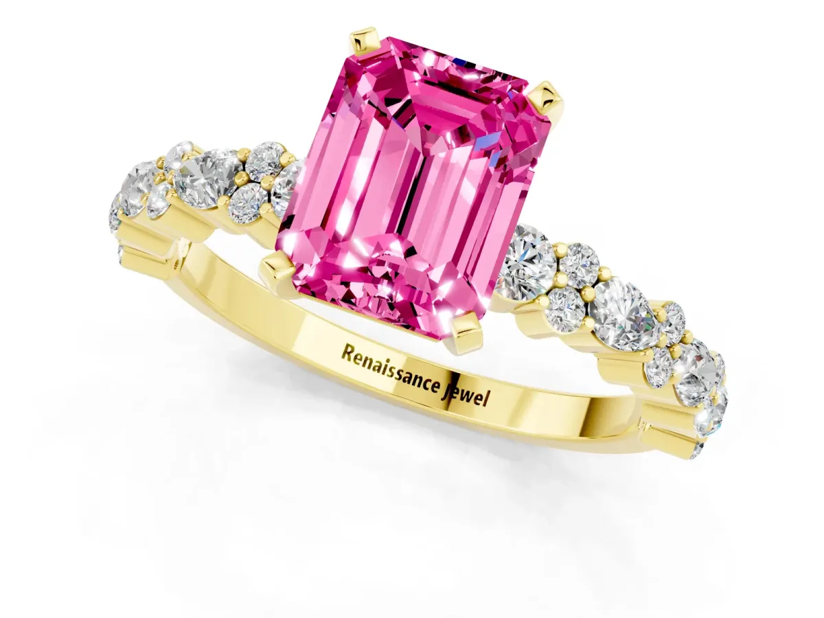 Emerald Cut Pink Sapphire Side Stone Solitaire Ring with Round and Four-Prong Setting Yellow gold