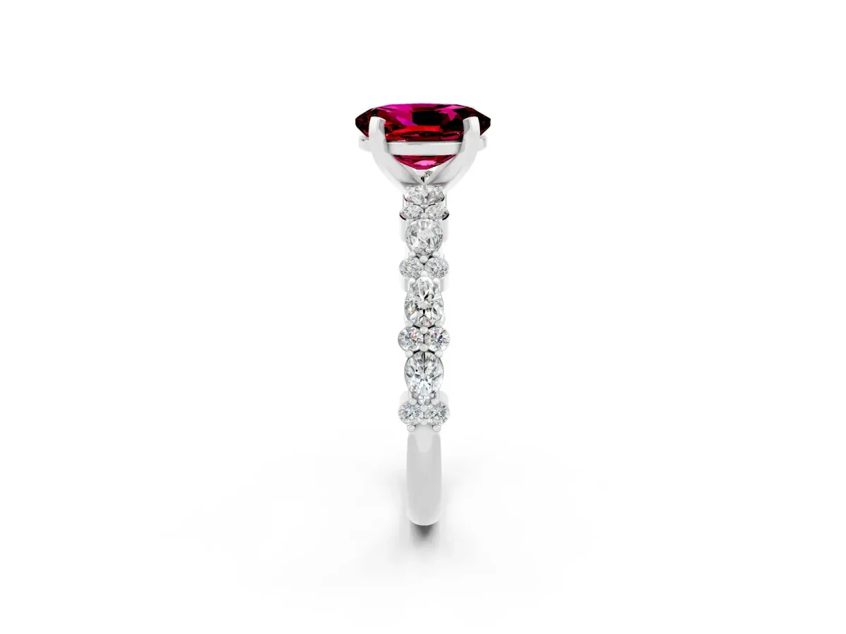 Oval Cut Garnet Side Stone Solitaire Ring with Round and Four-Prong Setting Platinum