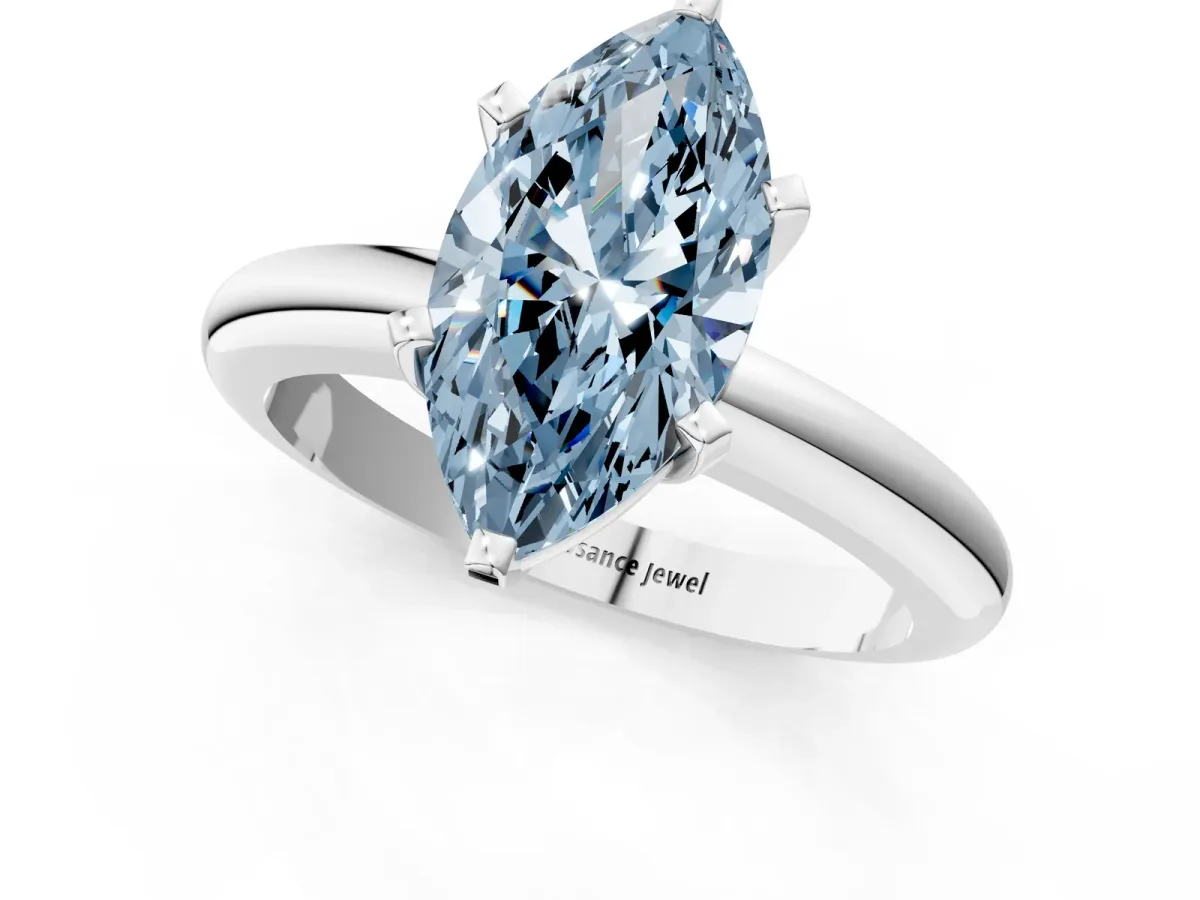 Fancy Blue Marquise Cut Diamond Solitaire Engagement Ring with Round Band and Four-Prong Setting Platinum