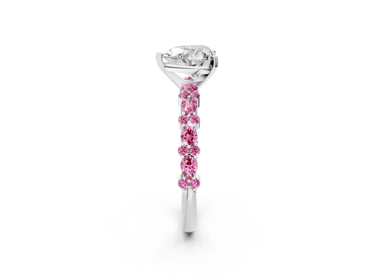 Heart Cut Diamond Side Stone Solitaire Ring with Round Pink Sapphire and Four-Prong Setting Platinum