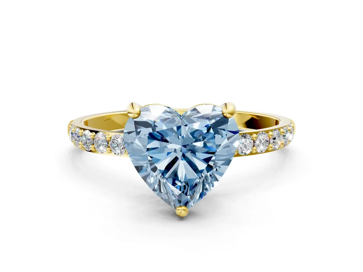 Fancy Blue Heart Cut Diamond Solitaire Ring with Round Pavé Band and Prong Setting Yellow gold