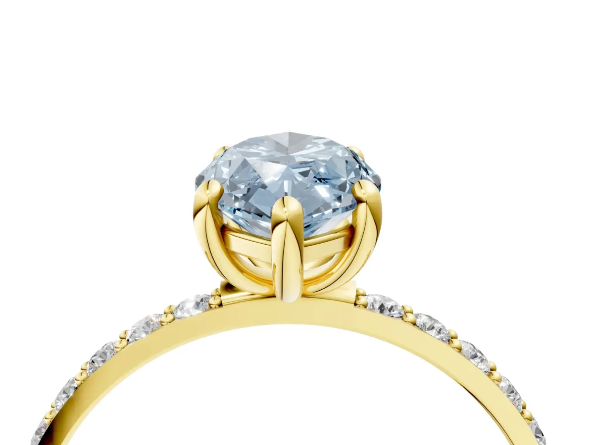 Fancy Blue Marquise Cut Diamond Solitaire Ring with Round Pavé Band and Prong Setting Yellow gold