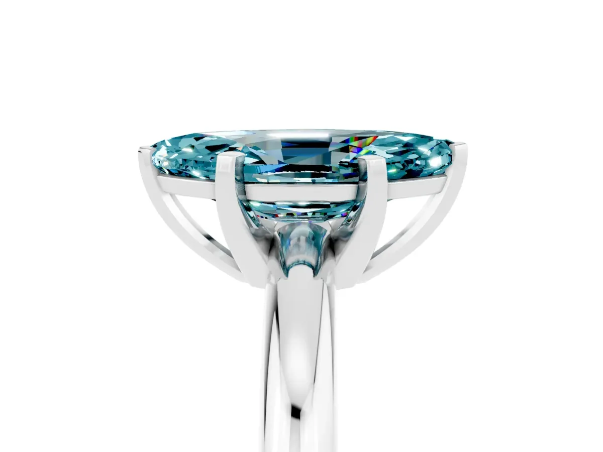 Marquise Cut Blue Topaz Solitaire Engagement Ring with Round Band and Four-Prong Setting Silver