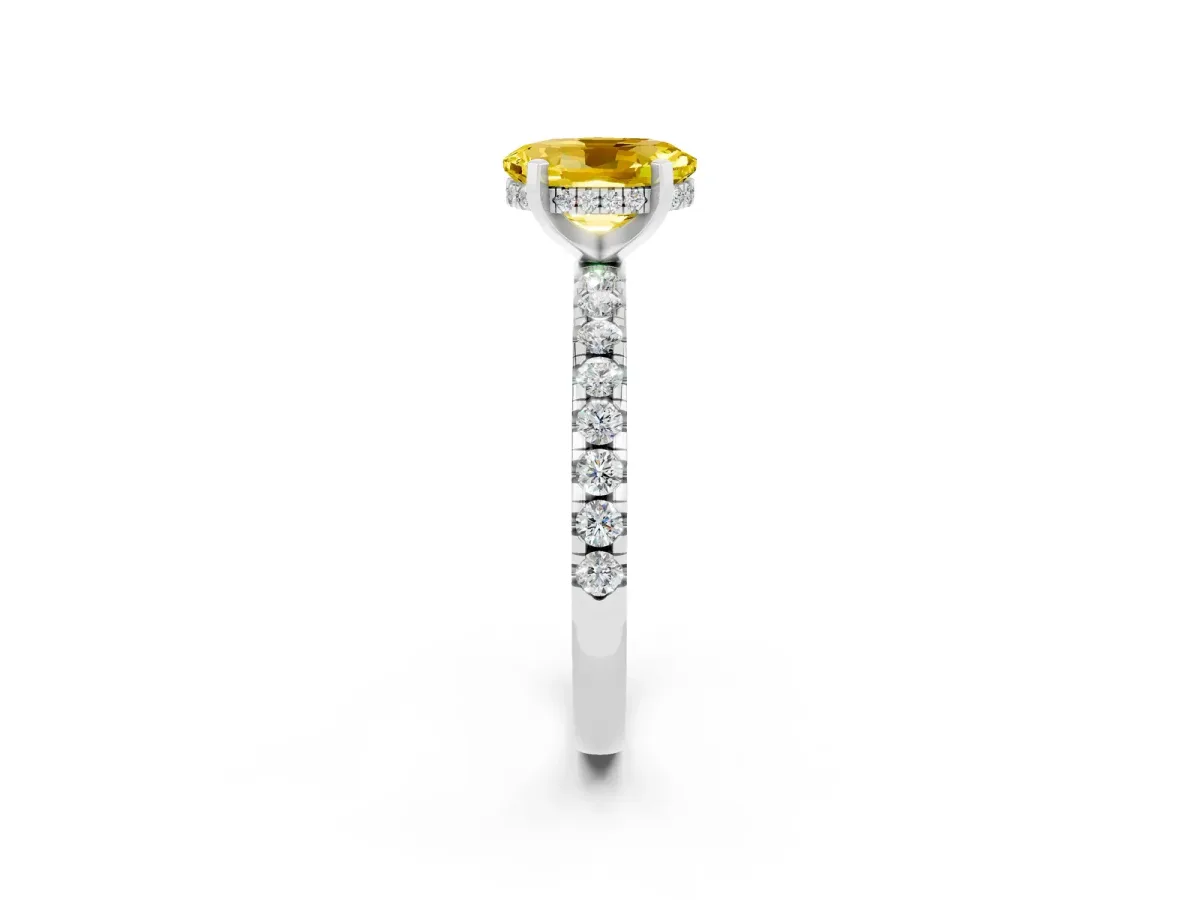 Oval Cut Yellow Sapphire Solitaire Ring with Round Pavé Band and Four-Prong Setting Silver