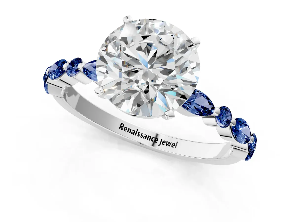 Round Cut Diamond Ring with Marquise and Round Blue Sapphire Side Stones and Four-Prong Setting Silver
